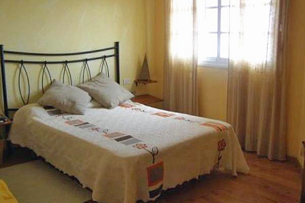 Schlafzimmer mit Doppelbett