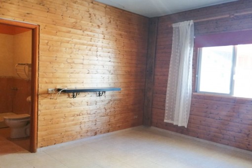 Schlafzimmer mit Badezimmer en Suite