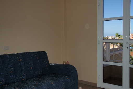 Schlafzimmer mit Ausgang zum Balkon